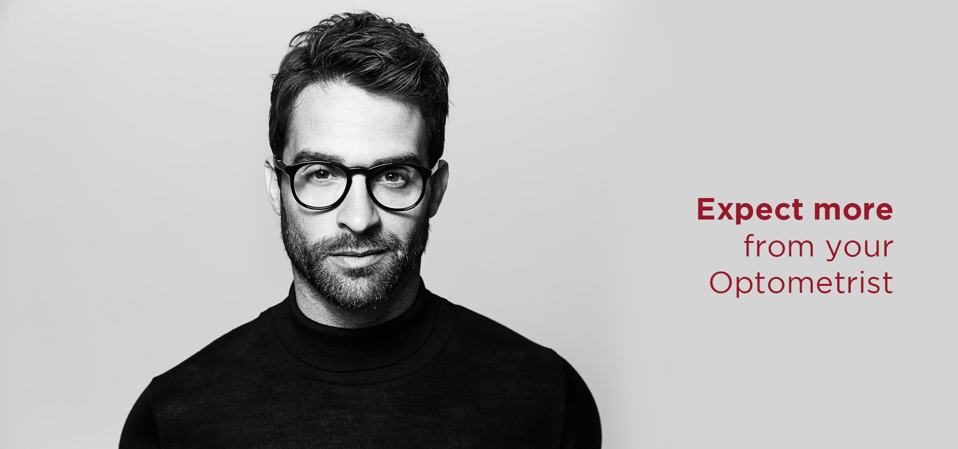 man with beard wearing glasses